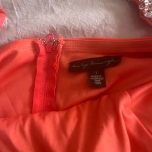 City Triangle coral colored floor length prom dress, jewel embellishments.